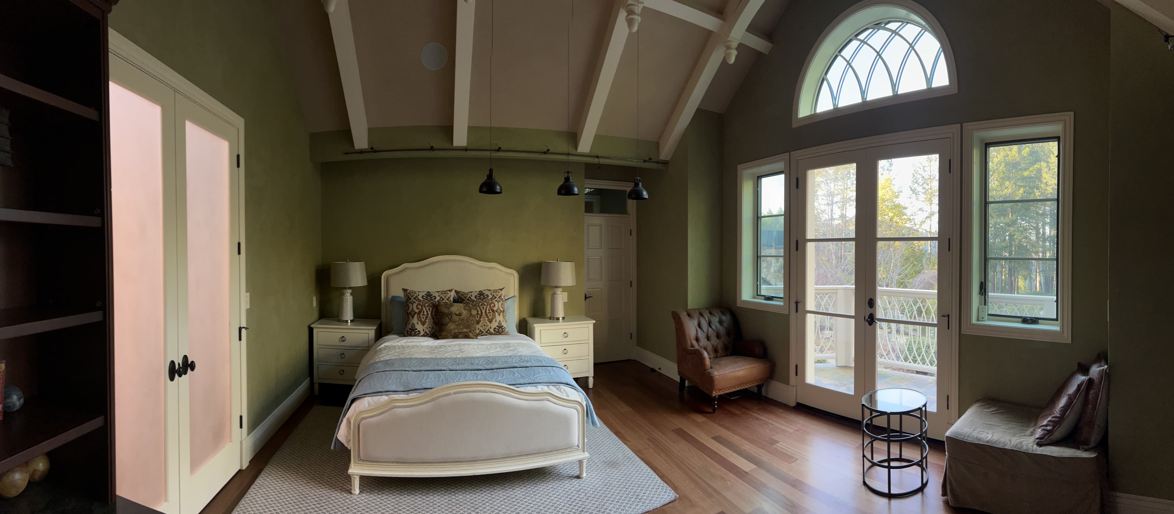 Retreat bedroom with green plaster walls